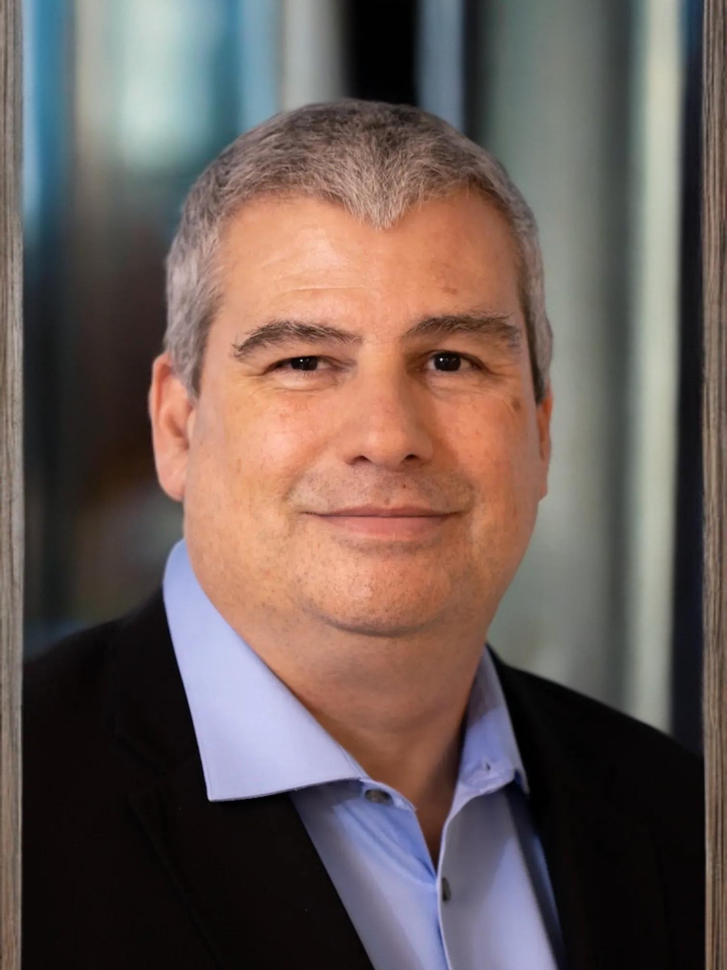 Kevin D Flynn Headshot-1